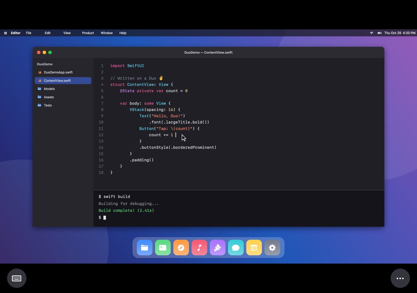 DuoVNC on the inner screen: a code editor and terminal on the Mac